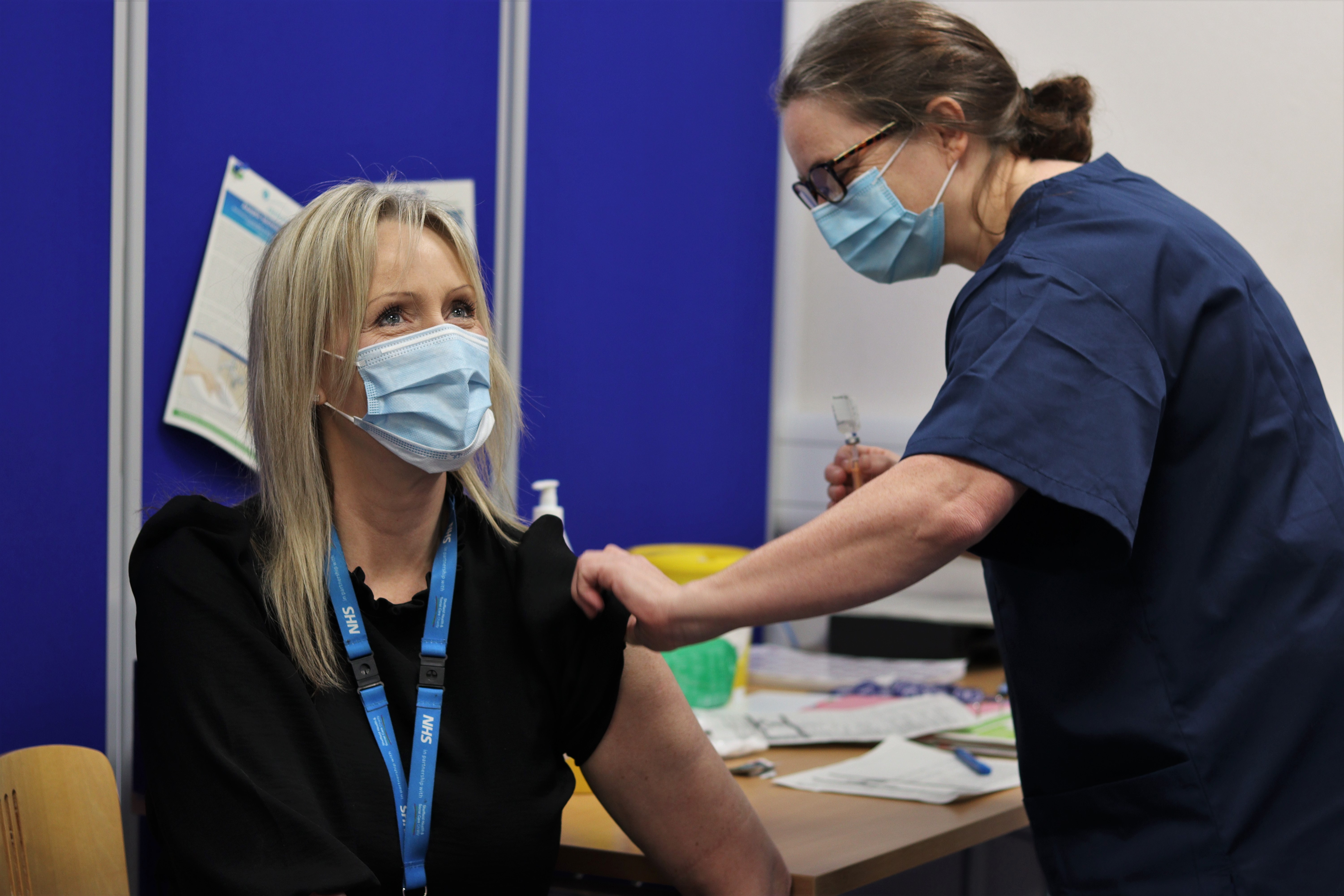 Donna Prescott receiving the COVID-19 vaccine