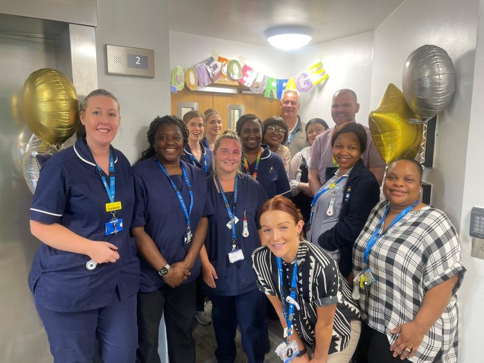 Burbage ward team with balloons and welcome sign